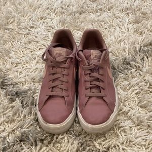 i’m selling pink and purple nike sb’s. a size 9 in womens and 7.5 in mens.